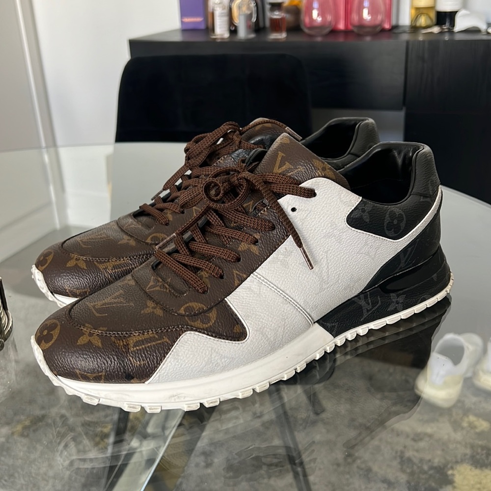 Louis Vuitton runners barely wore them.. 10 1/2 but runs big LV